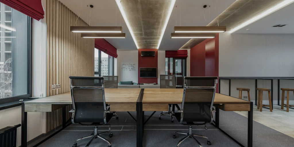 modern coworking office space with empty desks and chairs for remote professionals